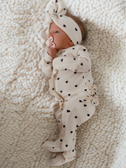 Organic Waffle 2-Way Zip Ruffle Footie, Black Heart