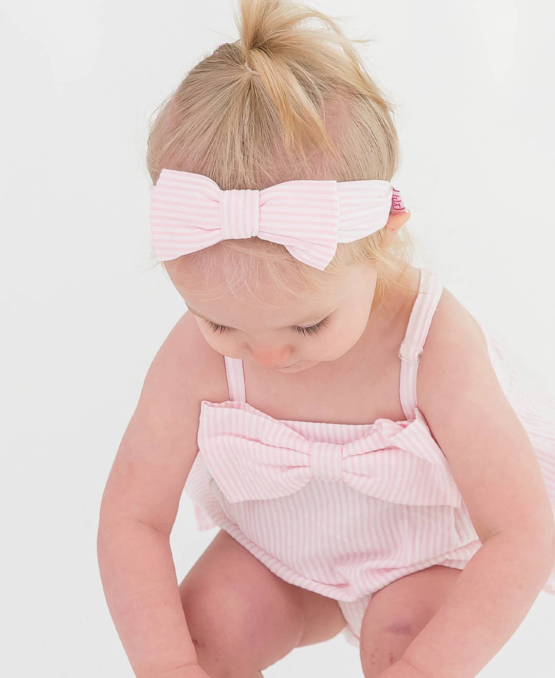 Baby Girls Pink Seersucker Bow Front Bubble Woven Romper
